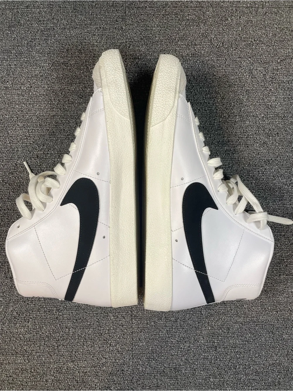 Men’s Nike White High-Top Sneakers with Black Swoosh